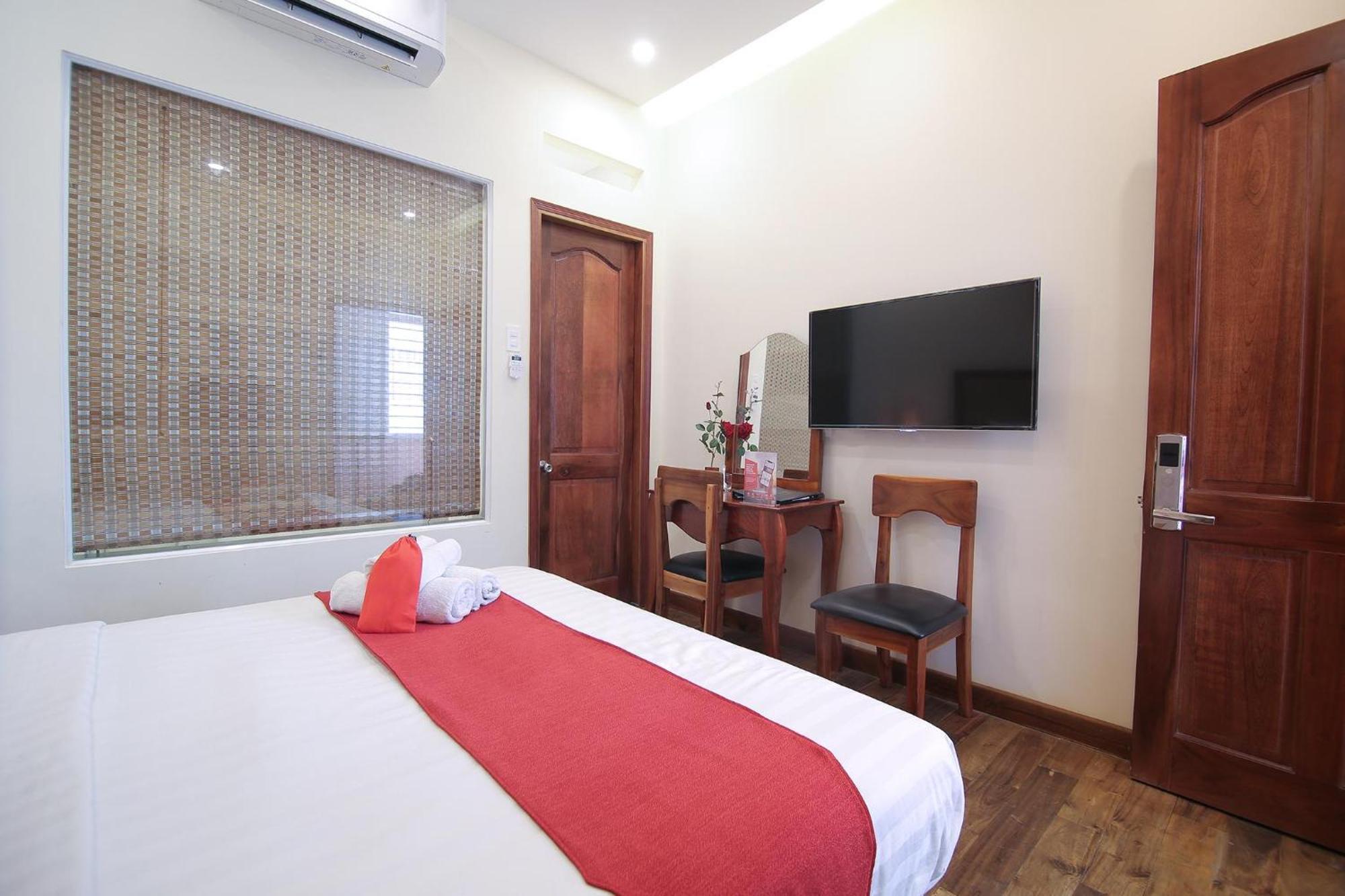 RedDoorz Premium @ Nguyen Thai Son Street Ho-Chi-Minh-Stadt Zimmer foto